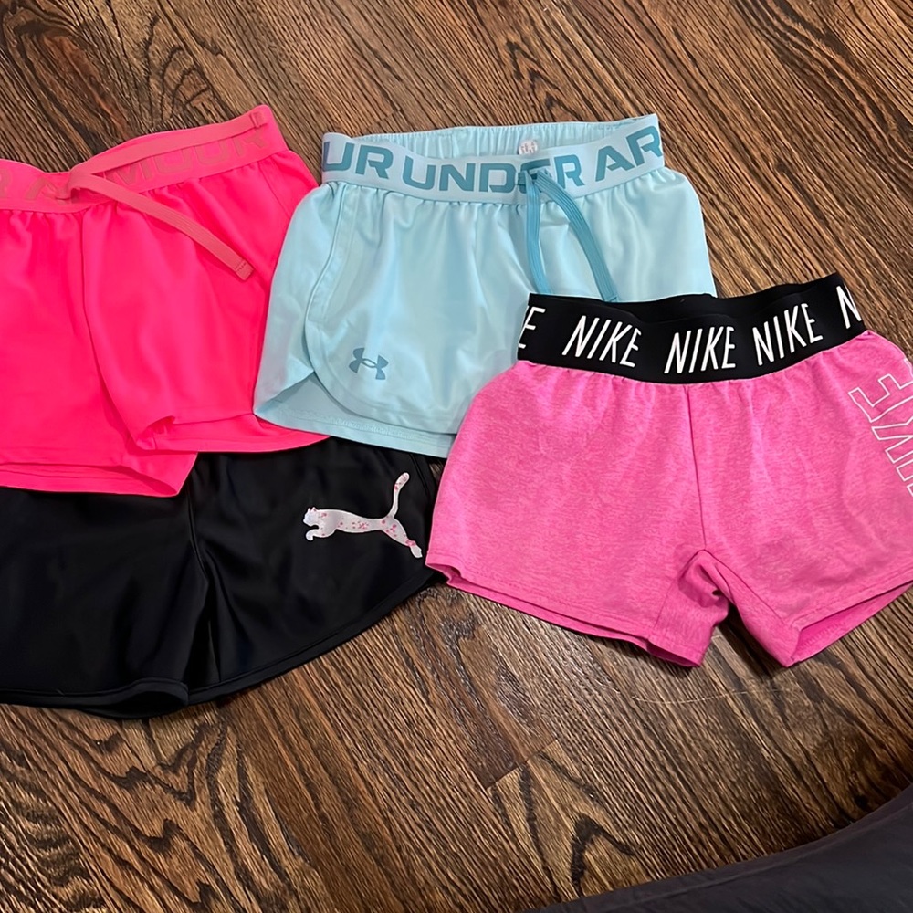 Girls Under Armour, Nike and Puma shorts all in a size Small